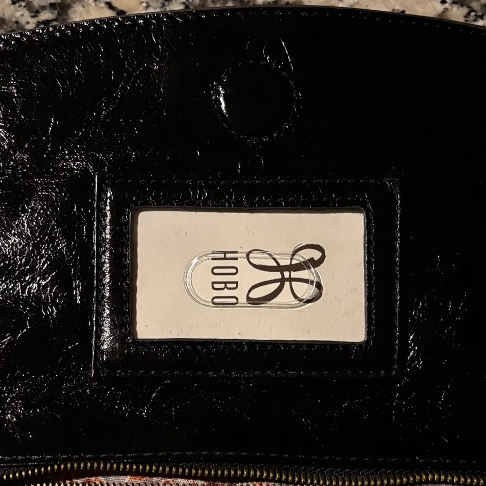 NWT HOBO Zeal Clutch Black Leather with Studded Detail